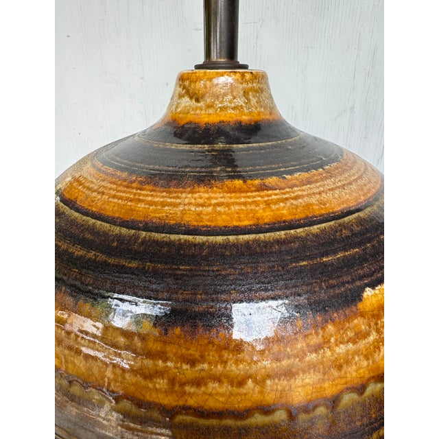 Make a dramatic design statement with this giant vintage Mid-Century Modern ball table lamp. Featuring a bold spherical...