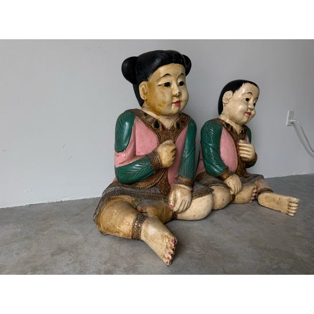 Vintage Asian Hand Carved Wood and Painted Seated Children Sculptures - a Pair For Sale - Image 4 of 12