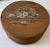Vintage wooden round cheese box with lid and hand painted flowers in a basket on the top. Inside has a green liner added...