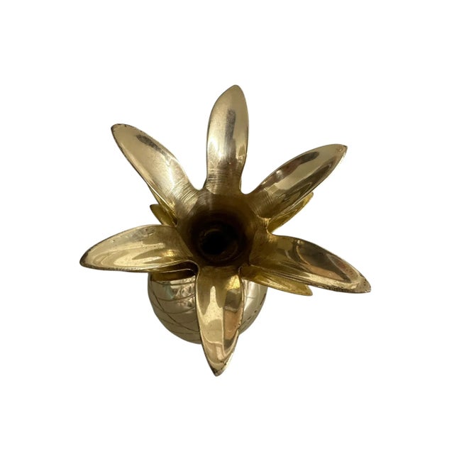 Vintage metal pineapple container — a charming decorative piece with timeless flair. Features detailed textured metalwork...