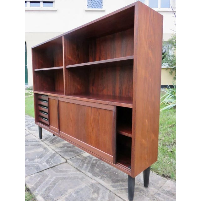 Long & Low Bookcase in Rosewood with Sliding Doors & Drawers from Sibast, 1960s, in Flawless conditions. Designed 1960 to...