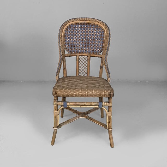 Italian Art Nouveau chairs in rattan and light blue rattan, early 1900s Pair of chairs in finely woven rattan. The rounded...