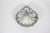 This is a vintage footed silverplated clam shell dish or bowl with feet. It has some patina, scratches and some spots of...