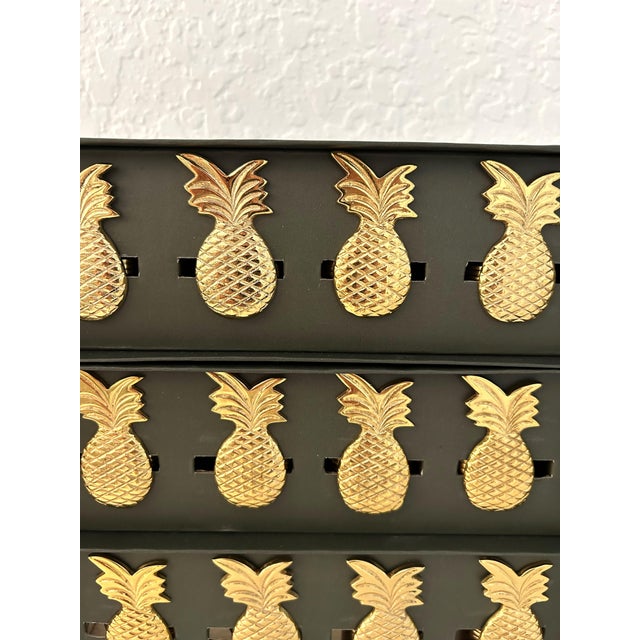 Lovely set of twelve vintage polished brass figural pineapple napkin rings. Excellent condition.