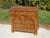Large French-made chest of drawers, late 19th century. Solid wood frame, walnut top and sides. The front is entirely...