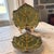 These Glazed Stoneware Roscher Leaf Shaped Olive Green Serving Plates are a unique and contemporary addition to any dining...