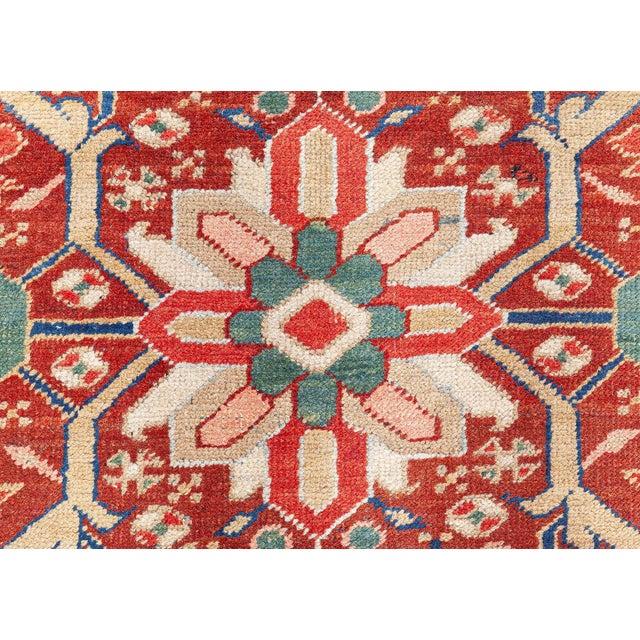 This magnificent antique Northwest Persian Bakshaish-Heriz rug, dating to the late 19th century, exemplifies the bold,...