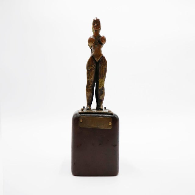 Circa 1970. We offer this Pal Kepenyes Sculpture made in brass and wood, signed. Pal Kepenyes was a Hungarian artist and...