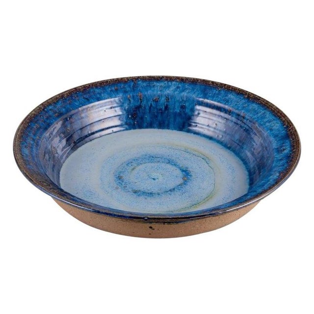 Frank Tromborg (b. 1937), Danish ceramist. Own workshop. Colossal unique ceramic bowl. Glaze in bluish hues. Partially...