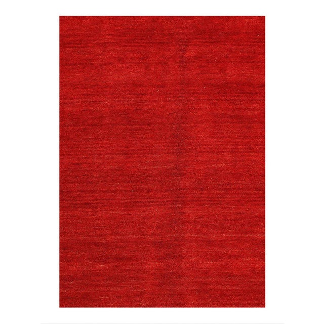 Gabbeh Rugs feature hand-spun wool in both the pile and foundation. These rugs are characterized by their abstract designs...