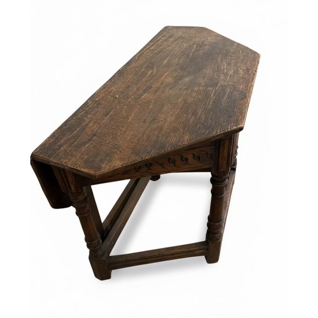 This&nbsp;charming antique&nbsp;side table is dated to the&nbsp;early 20th century&nbsp;and is of Spanish origin. The...