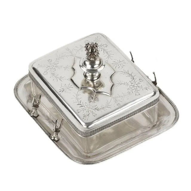 Austrian silver oil dish with glass. The turn of the 19th-20th centuries. A rectangular glass container for butter with a...