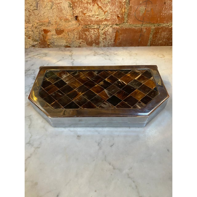 beautiful Italian decorative box 1970s with a very unique shape and silver details.