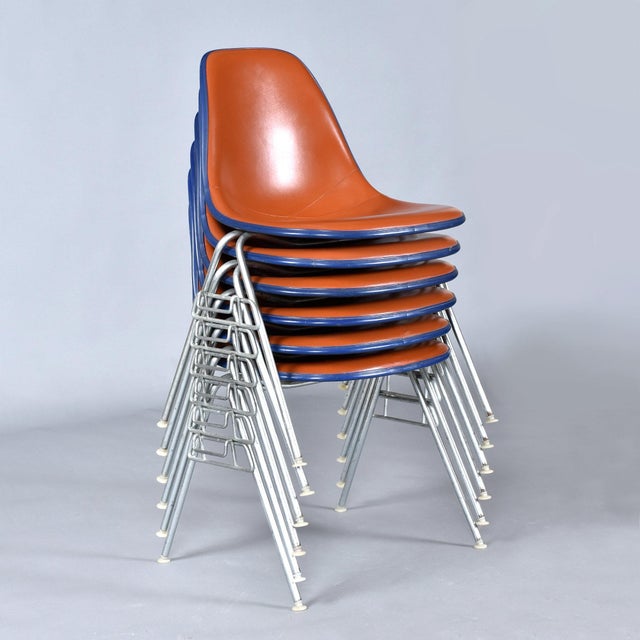 Group of 6 Eames stackable fiberglass shell chairs salvaged from the Eastern Airlines airport terminal in Atlanta. The...