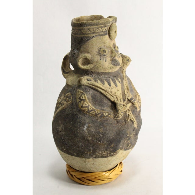 Burnt Umber Peruvian Bichrome Figural Effigy Jar of a Hunter With Trophy For Sale - Image 8 of 16