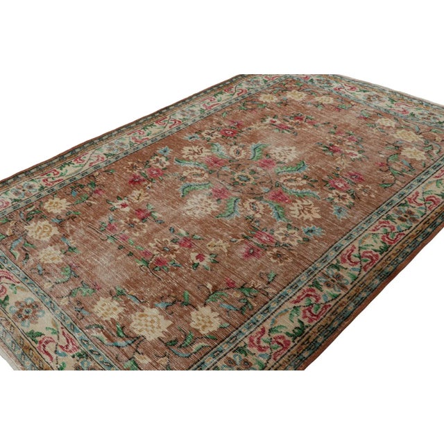 Hand-knotted in wool, circa 1960 - 1970, this 6x9 vintage Müren Art Deco rug design has a clear influence of traditional...