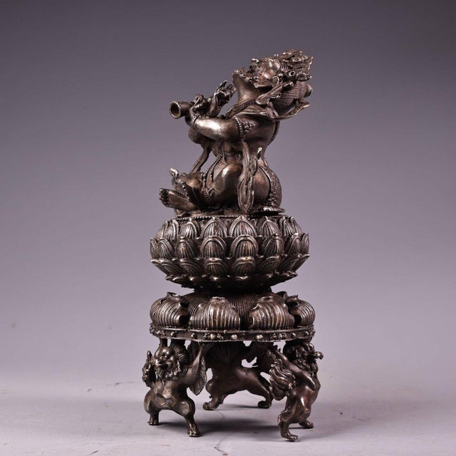 This is a finely cast silver-plated bronze incense burner (censer) featuring intricate high-relief (repoussé) and chiseled...
