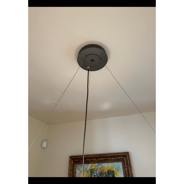 This Hubbardton Forge “Aura” 6-Light Pendant is a modern designer statement fixture. A striking and sculptural Aura...