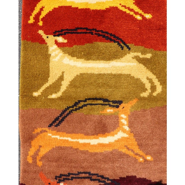 Measures: 1'9 x 5'2 European Art Deco Runner Rug with Gazelle Motifs in Warm Earth Tones. Keivan Woven Arts /...