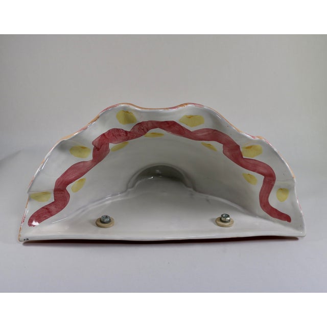 Large cone shaped wall pocket by MacKenzie-Childs in the colorful and whimsical Keukenhof pattern. This wall pocket has a...