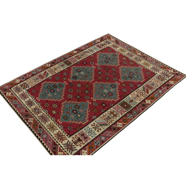 Handwoven in wool, this antique Kilim is the latest unveiled from R&K Principal Josh Nazmiyal’s coveted classic flat...