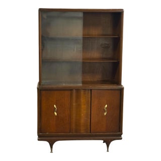 Mid 20th Century Modern Walnut China Cabinet With Sliding Glass Doors and Brass Hardware. For Sale