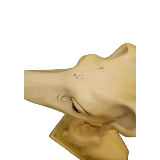 A wonderful whimsical vintage pale yellow whippet or greyhound dog statue by Marwal. The statue features a fun and...