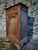 This rustic french pine cabinet was crafted in france during the 19th century and reflects the timeless character of...
