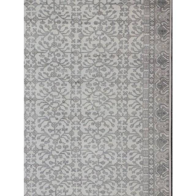 This modern Indian Khotan rug, made by Keivan Woven Arts, has been hand-knotted in wool and features an all-over, sub-...