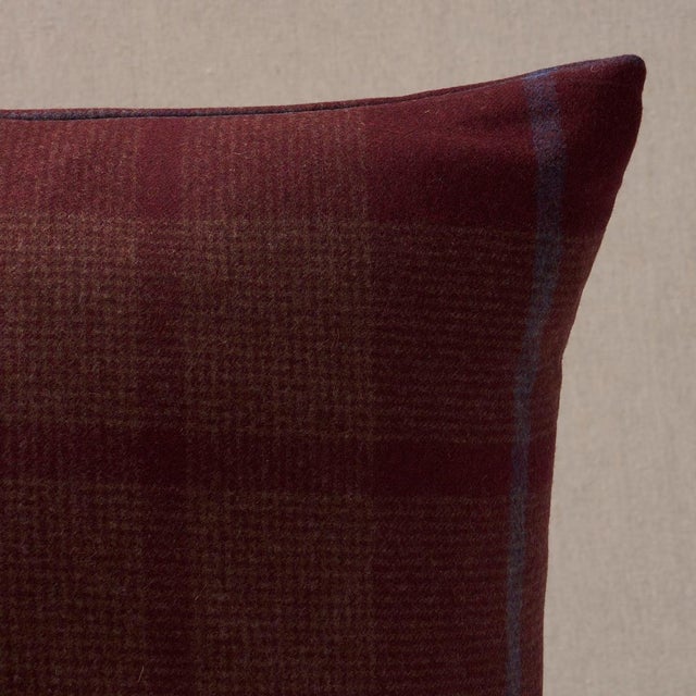 This pillow features Montana Wool Plaid with a knife edge finish. Montana Wool Plaid is a fine, tightly woven houndstooth...