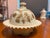Custard Glass table set in "Chrysanthemum Sprig" pattern by Northwood Glass Company, includes covered butter dish, covered...