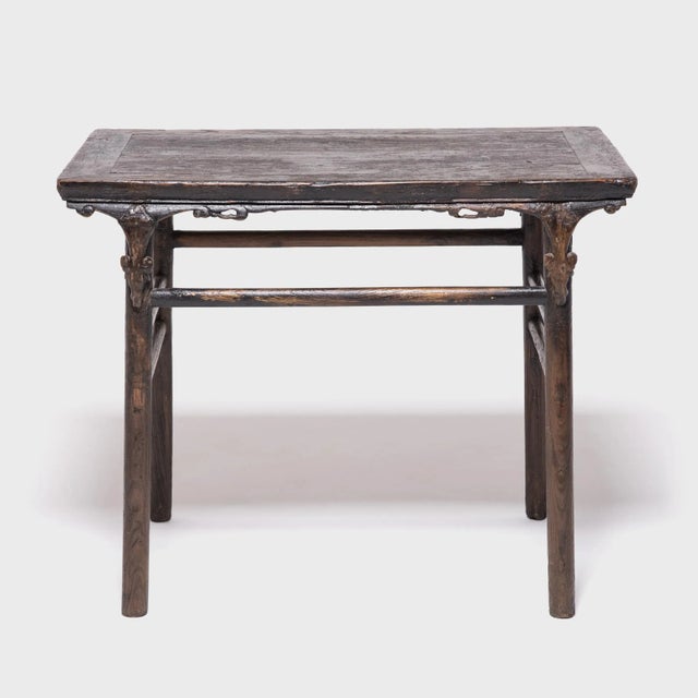 This late 18th century Chinese inset leg wine table is characterized by the lightness of its proportions, its finely...