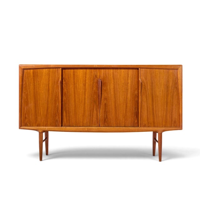Gunni Omann Mid Century Danish Teak High Sliding Door Credenza This credenza measures: 78.75 wide x 18.5 deep x 46.5...
