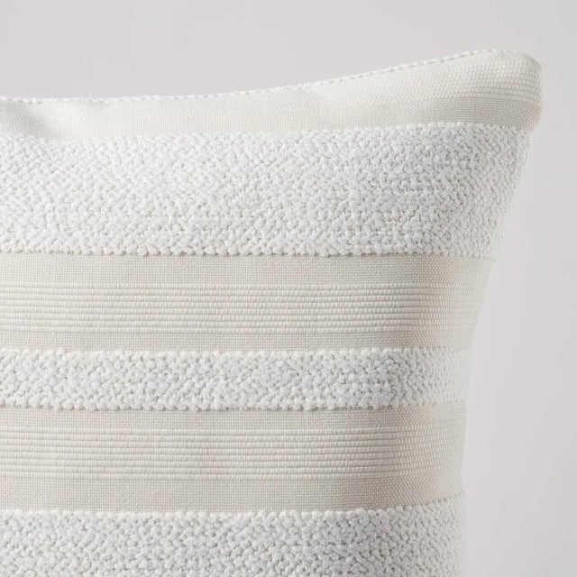 This pillow features Ohara Stripe I/O with a knife edge finish. This next-gen indoor-outdoor fabric is a woven stripe that...