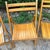 A beautiful and highly functional set of four mid-century modern folding chairs manufactured by Nevco Furniture Corp...