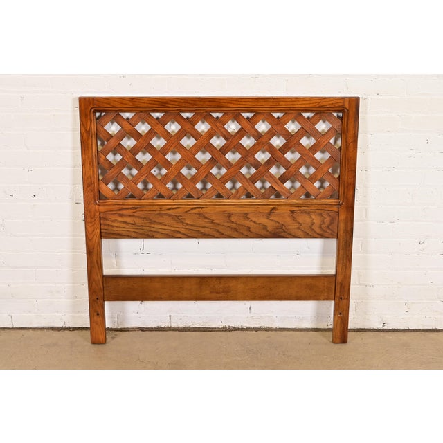 A gorgeous Mid-Century Modern carved oak woven front twin headboard By Henredon USA, Circa 1970s Measures: 39.5"W x 1.25"D...