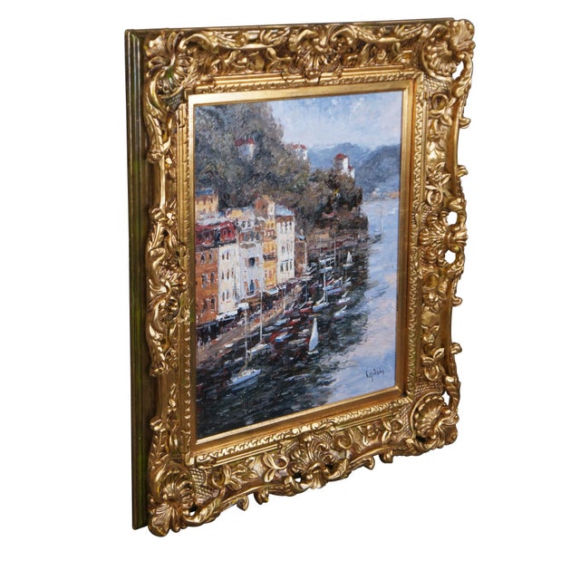 An impressionist seascape, signed lower right. The painting is on canvas and features a coastal town showing parts of the...