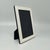 1970s Italian photo frame with glass. This frame is a superb example of the sleek, luxurious Modernist design language...