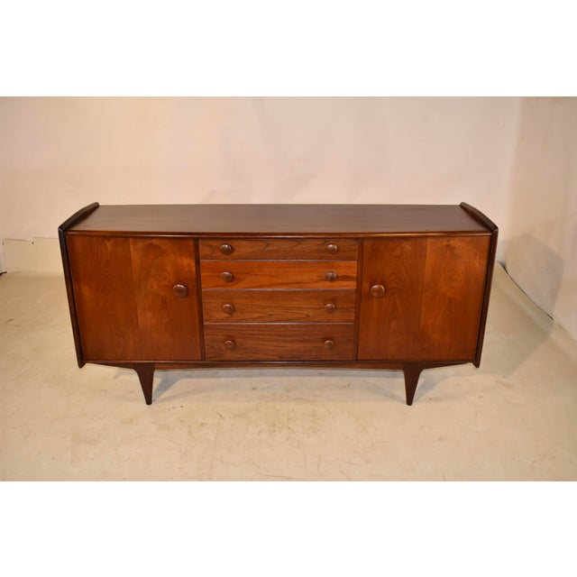 Mid Century Modern Teak Sideboard beautifully crafted by renowned British furniture maker A. Younger Ltd.,c. 1960’s. This...