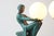 A striking pair of Art Deco table lamps by French sculptor Max Le Verrier, dating from circa 1930. Model: ''Délassement...