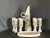 This is a beautiful set of handmade pottery. It is rare full drink set that includes a large pitcher, SEVEN stemmed cups...