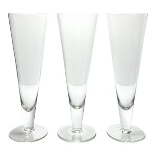 Contemporary Crate & Barrel Footed Beer Pilsner or Fluted Champagne Glasses - Set of 3 For Sale