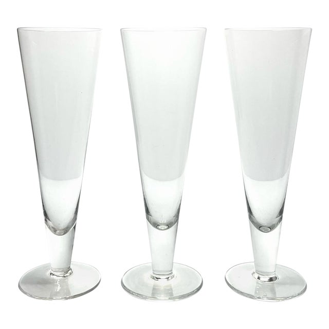Contemporary Crate & Barrel Footed Beer Pilsner or Fluted Champagne Glasses - Set of 3 For Sale