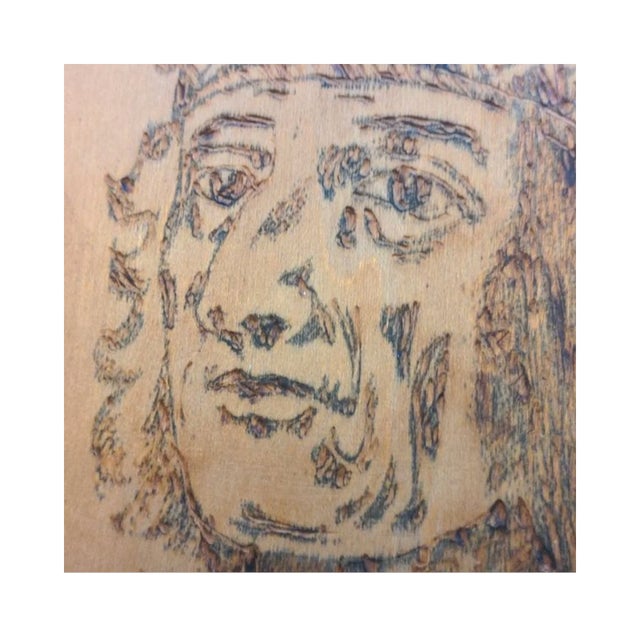 Beautifully detailed Flemish pyrography engraving of an Native American Indian with feather headdress. Circa early 1900's.