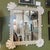 Vintage painted carved wood wall mirror with shell motif