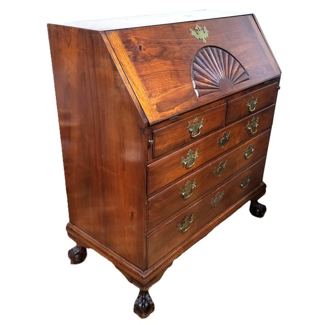 We have a pleasure to offer you this beautiful American Antique 20th century Chippendale Ball & Claw Slant Front Desk. It...