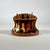 A seven-piece smoking set, including (i) a vintage wooden pipe stand or rack, circular in form with a shaped, scalloped-...