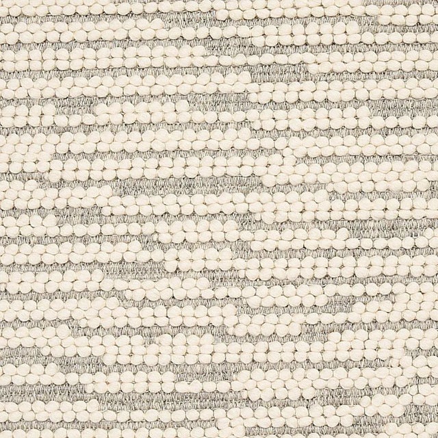 Channeling handmade fiber art from the ‚Äò70s, Anni is all about texture. This wool fabric celebrates the contrast between...