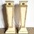 This striking pair of postmodern pedestals showcases sculptural architectural form rendered in richly layered tessellated...