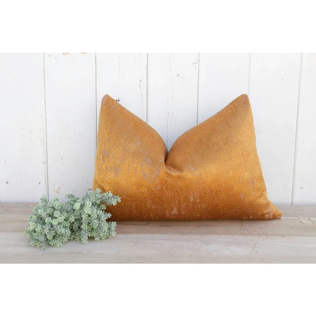 This luxurious Bagh Phulkari pillow features beautiful fine silk embroidery with a diamond pattern on a cotton fabric....